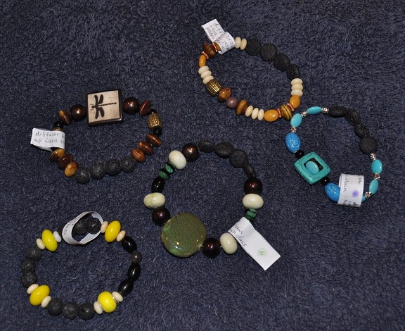 Diffuser Bracelets! These bracelets will give up to 24 hours of aromatherapy when you add your essential oil onto the lava stones in the bracelet. 
Art Rains Jewelry